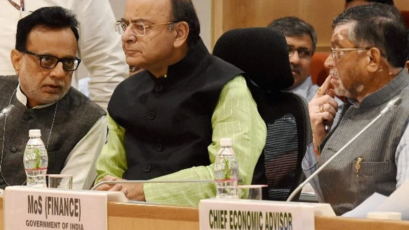 Arun Jaitley, GST council, GST, Hasmukh Adhia Union Finance Minister Arun Jaitley with MoS Santosh Gangwar and Revenue Secretary Hasmukh Adhia at the 15th Goods and Services Tax (GST) meeting in New Delhi