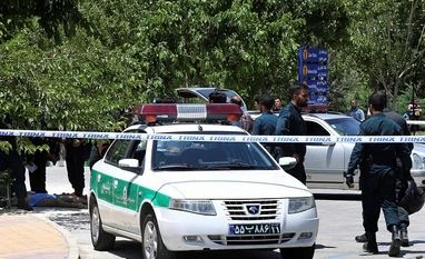 Attackers in women clothing raid Iran Parliament, mausoleum; 12 dead Iran Parliament attack