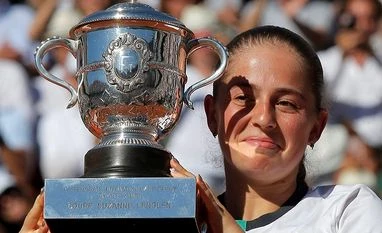 Jelena Ostapenko stuns Simona Halep to win French Open Latvia's Jelena Ostapenko holds the cup after defeating Romania's Simona Halep in their final match of the French Open tennis tournament at the Roland Garros stadium