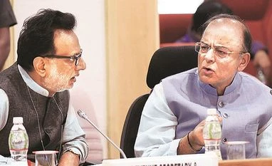 Insulin, salt, set-top box: Full list of items that get cheaper under GST Union Finance Minister Arun Jaitley (right) and Revenue Secretary Hasmukh Adhia during the 16th GST Council meeting at Vigyan Bhavan in New Delhi on Sunday