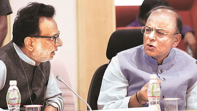 Union Finance Minister Arun Jaitley (right) and Revenue Secretary Hasmukh Adhia during the 16th GST Council meeting at Vigyan Bhavan in New Delhi on Sunday Union Finance Minister Arun Jaitley (right) and Revenue Secretary Hasmukh Adhia during the 16th GST Council meeting at Vigyan Bhavan in New Delhi on Sunday