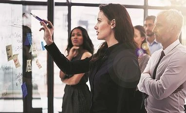 Diversity in the 'man cave':More women in boardrooms but minorities lag Boardroom