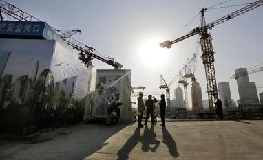 China's economy holds up in May but slowing investment points to cooling China, Economy