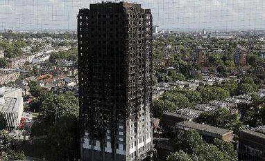 Arconic tumbles on news it sold flammable panels used at Grenfell The scorched facade of the Grenfell Tower in London, Thursday, June 15, 2017. Photo: AP/PTI
