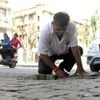 Meet Dadarao Bilhore, the man who has filled 300 potholes on his own