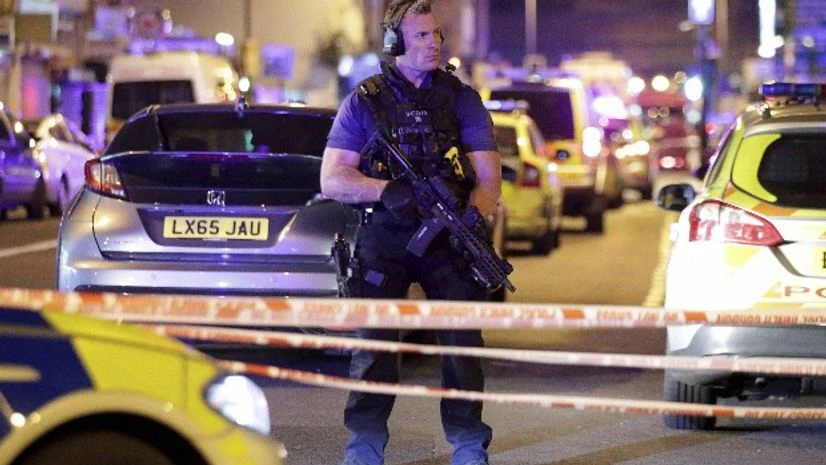 London mosque attack An armed police officer mans a cordon on the Seven Sisters Road at Finsbury Park where a vehicle struck pedestrians in London