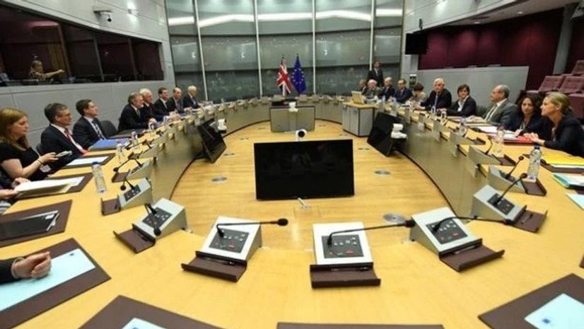 EU, Brexit, Britain, UK, Europe Britain's Secretary of State for Exiting the European Union David Davis and his delegation sit across from European Union's chief Brexit negotiator Michael Barnier and his delegation at the start of their first day of talks at the European Commission