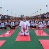 Yoga a free life insurance, says Modi while performing asanas in Lucknow