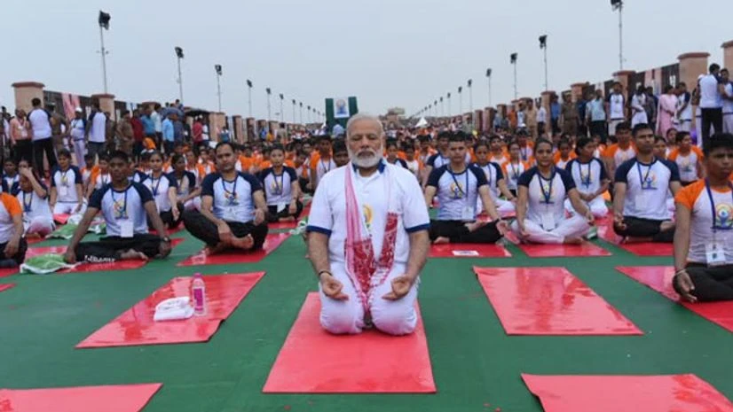 Yoga a free life insurance, says Modi while performing asanas in Lucknow Yoga a free life insurance, says Modi while performing asanas in Lucknow