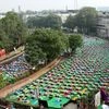 See pics: Hope you practice 'asanas' everyday, says Kejriwal on Yoga Day