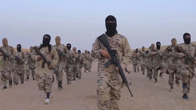 File Photo: ISIS attackers (Photo: PTI/AP) File Photo: ISIS attackers (Photo: PTI/AP)