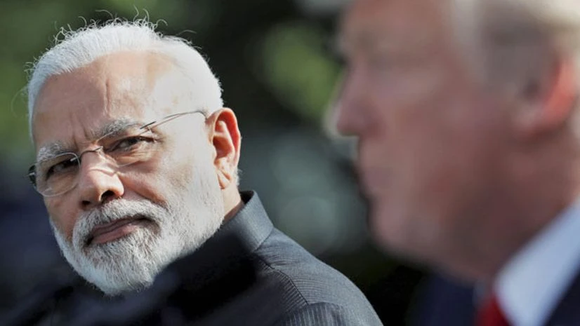 Prime Minister Narendra Modi looks toward US President Donald Trump as he speaks in the Rose Garden at the White House. Photo: AP/PTI Prime Minister Narendra Modi looks toward US President Donald Trump as he speaks in the Rose Garden at the White House. Photo: AP/PTI