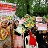 Kites workers hold placards and shout slogans during a protest against  implementation of  Good and service Tax GST in Ahmedabad on Saturday. Photo: PTI