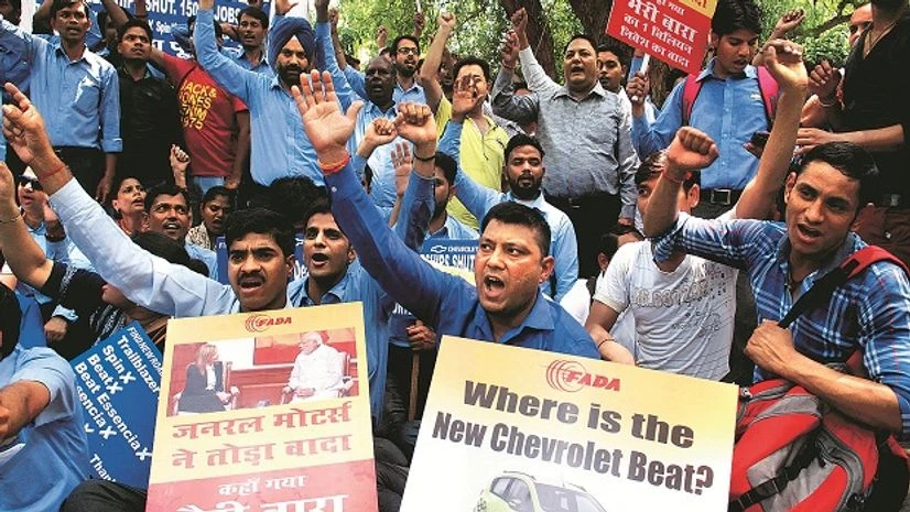 A majority of GM India’s 96 dealers has opposed its offer of around 12 per cent of their investments as compensation A majority of GM India’s 96 dealers has opposed its offer of around 12 per cent of their investments as compensation