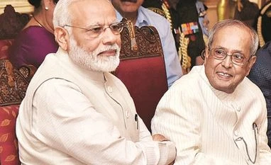 Modi's farewell letter to ex-Prez Mukherjee: You have been a father figure President Pranab Mukherjee with Prime Minister Narendra Modi at a book launch in New Delhi. (File Photo: PTI)