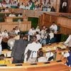 Opposition National Conference and Congress MLA's shout slogans during their protest against the implementation of Goods and Services Tax (GST) during the Special Session of Legislative Assembly, which was called to pass the GST bill, in Srinagar