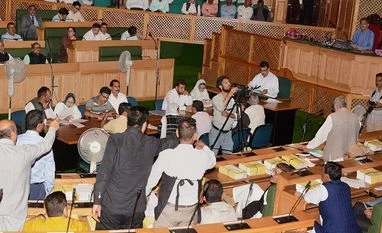 I can lynch you here, J&K minister tells NC MLA in Assembly over GST Opposition National Conference and Congress MLA's shout slogans during their protest against the implementation of Goods and Services Tax (GST) during the Special Session of Legislative Assembly, which was called to pass the GST bill, in Srinagar