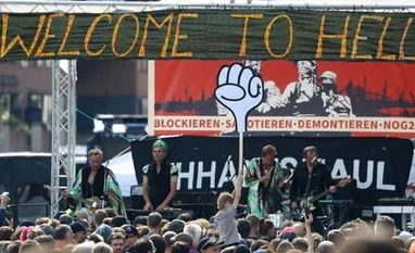 G-20 protests: 76 hurt in Hamburg as German police use water canons G-20 protests: 76 hurt in Hamburg as German police use water canons