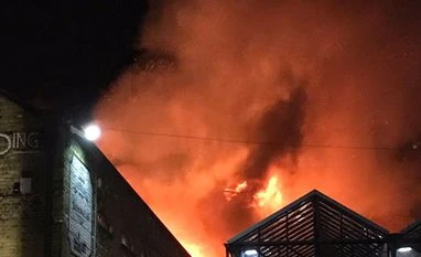 No casualties yet at London's Camden market; avoid area, firefighters warn We now have ten fire engines and over 70 firefighters dealing with the Camden Lock Market fire. Please avoid the area: London Fire Brigade