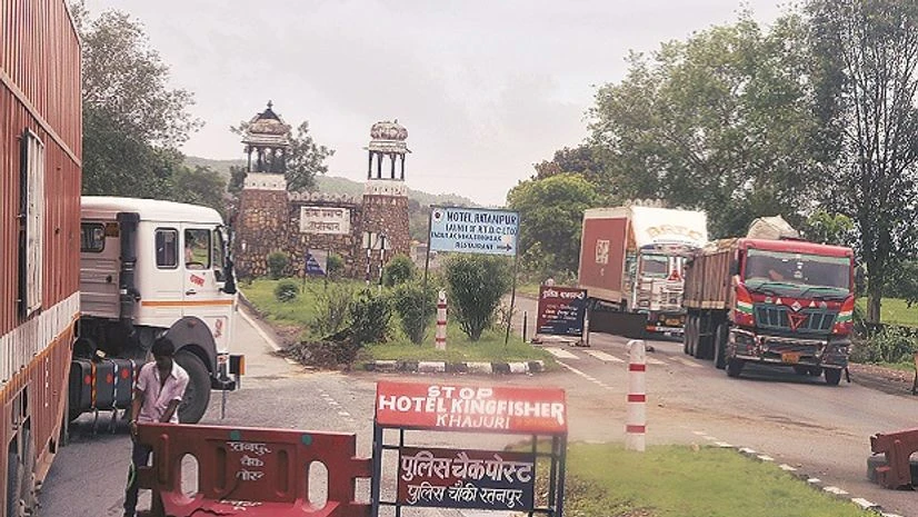 Trucks held up at a check-point in Rajasthan. While the time taken by trucks to travel between states has gone down, the benefits of the GST have not been uniform. Photo: N Sundaresha Subramanian Trucks held up at a check-point in Rajasthan. While the time taken by trucks to travel between states has gone down, the benefits of the GST have not been uniform. Photo: N Sundaresha Subramanian