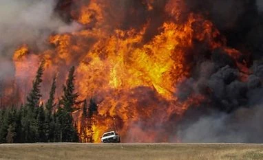 'The whole world was on fire': Infernos choke California yet again Canada wildfire: Thousands of people unable o return home as blazes rage on
