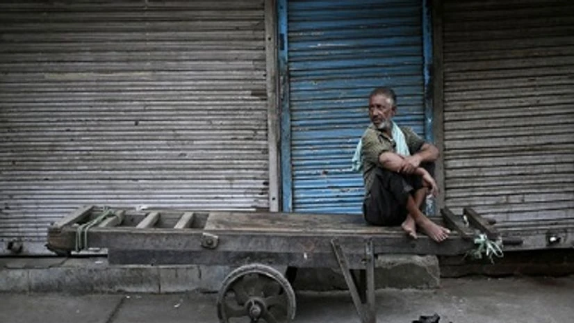poor POOR OPPORTUNITIES: A migrant in Delhi