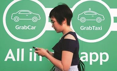 The Singapore-based ride-hailing company said on Monday it expects to close another $500-million fund from unspecified new and existing backers. Photo: reuters The Singapore-based ride-hailing company said on Monday it expects to close another $500-million fund from unspecified new and existing backers. Photo: reuters