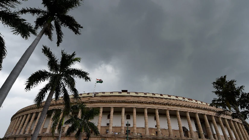 Parliament, Monsoon session Dark clouds seen over the Parliament house during the ongoing monsoon session in New Delhi. (Photo: PTI)