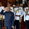 President Ram Nath Kovind at Rahstrapati Bhawan before departing for Parliament for his swearing-in ceremony, in New Delhi. (Photo: PTI)