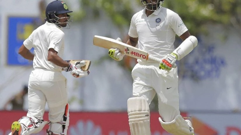 File photo: India's Ravichandran Ashwin, right, and Wriddhiman Saha run between wickets during the second day's play of the first test cricket match between India and Sri Lanka in Galle, Sri Lanka. File photo: India's Ravichandran Ashwin, right, and Wriddhiman Saha run between wickets during the second day's play of the first test cricket match between India and Sri Lanka in Galle, Sri Lanka.