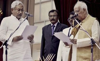 Nitish Kumar returns as Bihar CM for sixth time Bihar Governor Keshari Nath Tripathi administers oath to JD(U) President Nitish Kumar as Bihar Chief MInister at Raj Bhawan, in Patna.
