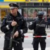 Police guard the attack site in Hamburg, Germany