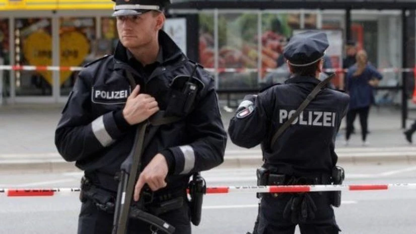 Police guard the attack site in Hamburg, Germany Police guard the attack site in Hamburg, Germany