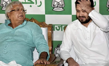 Legal notice sent to Lalu Prasad, Tejashwi for comments on Nitish Kumar RJD chief Lalu Prasad with son Tejaswi Yadav. (File Photo)