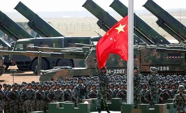 Won't allow anyone to split our territory, damage sovereignty: Xi Jinping Chinese People's Liberation Army (PLA) troops perform a flag raising ceremony on July 30 for a military parade to commemorate the 90th anniversary of the founding of the PLA on Aug 1 at Zhurihe training base. (Photo: PTI)