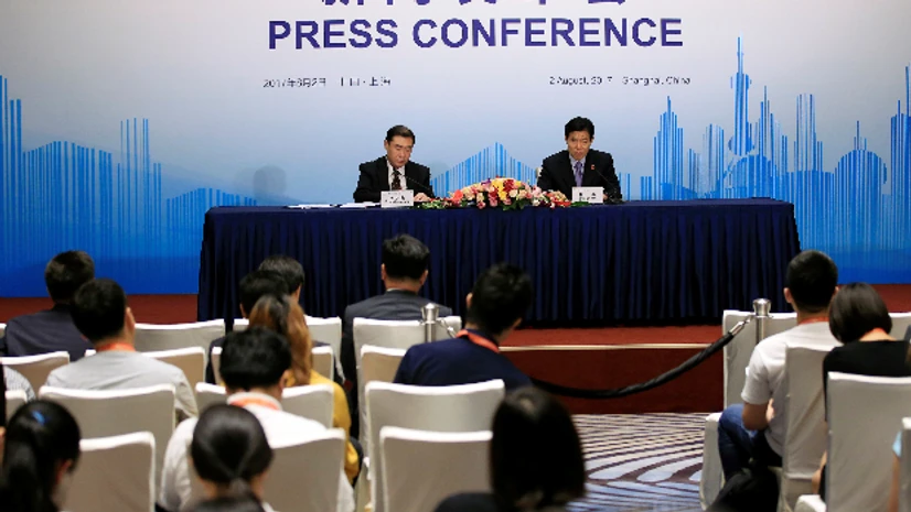 BRICS 2017, Brazil, Russia, India, China, South Africa, trade ministers, trade,Zhong Shan, Commerce Minister China's Commerce Minister Zhong Shan (R) attends a news conference of BRICS (Brazil, Russia, India, China and South Africa) trade ministers meeting in Shanghai, China August 2. (Photo: Reuters)
