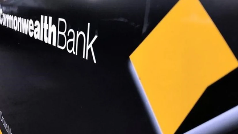 Commonwealth Bank of Australia File photo of a Commonwealth Bank of Australia logo adorns the wall of a branch in Sydney, Australia. (Photo: Reuters)