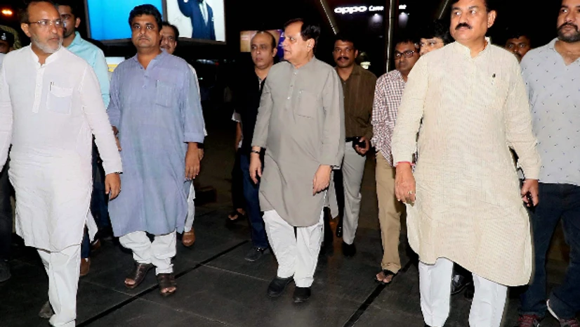 Ahmed Patel, Congress, Ahemdabad, Rajya Sabha polls, RS Senior Congress leaders Bharatsinh Solanki, Arjun Modhwadia, Ahmed Patel at Ahmedabad airport during arrival of the party's MLAs from Karnataka on Monday, ahead of Rajya Sabha elections. (Photo: PTI)