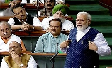 Go to field to understand ground realities: PM to collectors Prime Minister Narendra Modi speaks in the Lok Sabha in New Delhi on Wednesday. Photo: PTI