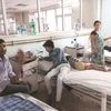 Patients and their attendants at the Baba Raghav Das Medical College at Gorakhpur in Uttar Pradesh. Photo: Sahil Makkar