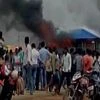 Angry labourers burnt the port’s main gate, three offices, an oil tanker and vehicles, police at the spot in Bhadrak in?Odisha.