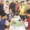 Nihal Sarin (left) and Aravindh Chithambaram at the Rapid & Blitz tournament in Bengaluru. Photo: Saggere Radhakrishna