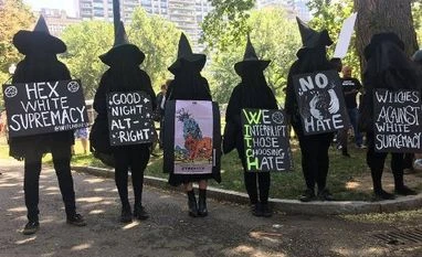 Anti-racism march dwarfs far-right rally in Boston, police avert violence Witches against white supremacy. Photo: Twitter (@BearUNLV)