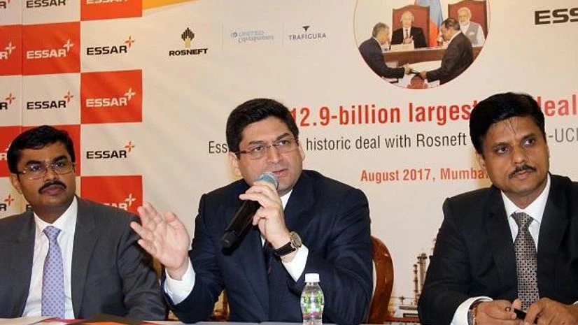 Essar Energy Holdings, Dhanpat Nahata, Essar Capital, Prashant Ruia, Suresh Jain, Essar Oil sale, Essar Oil, Rosneft, Trafigura-UCP Consortium After Essar Oil sale to Rosneft, Ruias to pare 67% of Rs 1.05 lakh cr debt