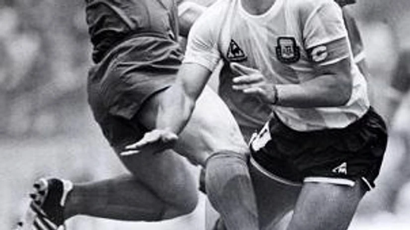 At the end of a brutal challenge from South Korea’s Kim Yong-Se during Argentina’s first group game At the end of a brutal challenge from South Korea’s Kim Yong-Se during Argentina’s first group game