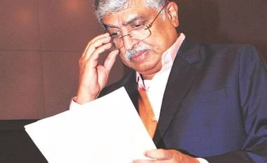 Infosys spat: Nandan Nilekani to build confidence, say employees Nilekani at a press conference in Bengaluru on Friday.