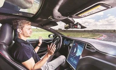 Driverless cars could see humankind sprawl ever further into countryside A Tesla Model S car fitted with self-driving technology Photo: Bloomberg
