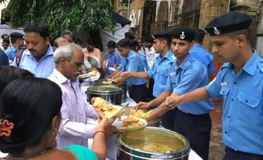 See Photos | Mumbai rains: Navy opens food counters for stranded commuters Mumbai rains: Indian Navy opens food counters for stranded commuters