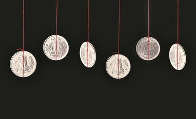 Rupee revisits 1-week high, up 8 paise ahead of key macro data rupee, coins