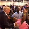 Harvey evacuees take a selfie with Trump. Screenshot: Twitter ( @realDonaldTrump)